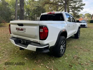 2023 GMC Canyon 4WD AT4 with VIN 1GTP6DEK1P1139203, listed as a Copart auction lot 80591804 with 17,468 mi miles and Clean Title. Bid and sale history available at carsss.com. Image 4.