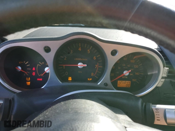 2003 Nissan 350Z Touring z VIN JN1AZ34E73T016672, wystawiony jako Copart lot #52968375 z przebiegiem 125 844 mil mil oraz Szkoda całkowita • Salvage title. Historia ofert i sprzedaży dostępna na DreamBid. Obrazek 9.