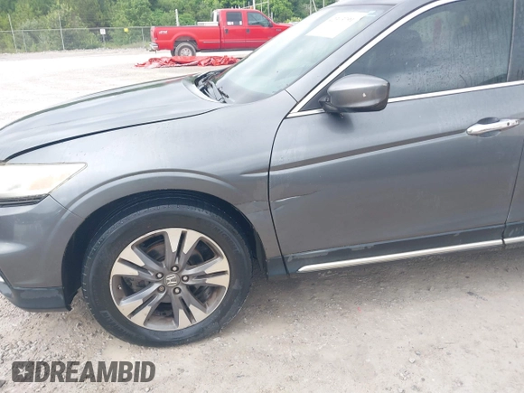2013 Honda Crosstour EX-L z VIN 5J6TF1H56DL002352, wystawiony jako IAAI lot #42303791 z przebiegiem 178 443 mil mil oraz . Historia ofert i sprzedaży dostępna na DreamBid. Obrazek 6.