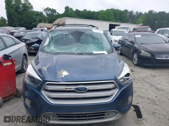 2018 Ford Escape Titanium with VIN 1FMCU0J99JUA12717, listed as a IAAI auction lot 42237509 with 123,896 mi miles and . Bid and sale history available at DreamBid. Image 12.