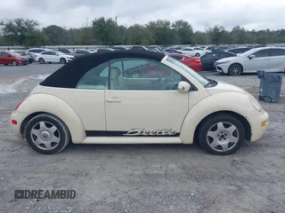 2004 Volkswagen Beetle with VIN 3VWCM21Y64M306721, listed as a IAAI auction lot 41611494 with 183,434 mi miles and . Bid and sale history available at DreamBid. Image 13.