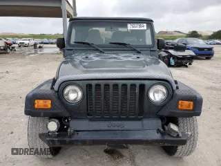 2003 Jeep Wrangler SE with VIN 1J4FA29103P313229, listed as a Copart auction lot 79337984 with 135,668 mi miles and Salvage title. Bid and sale history available at DreamBid. Image 5.