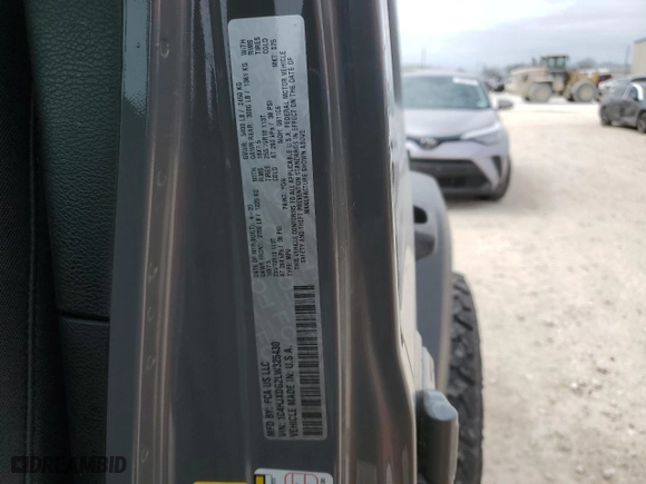 2020 Jeep Wrangler Unlimited Sport Altitude with VIN 1C4HJXDG2LW325430, listed as a Copart auction lot 46953185 with 69,919 mi miles and Salvage Title. Bid and sale history available at carsss.com. Image 14.