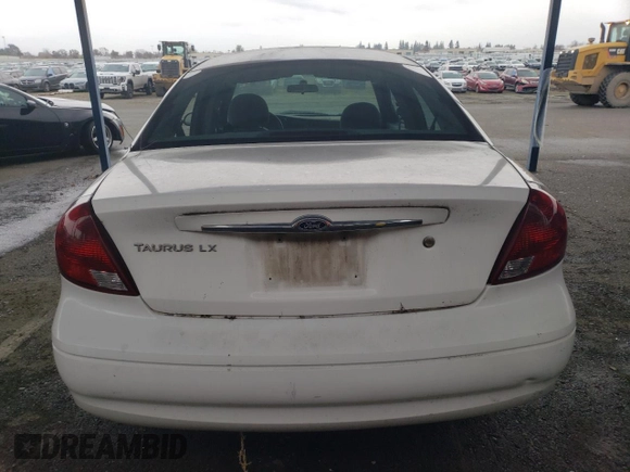 2003 Ford Taurus LX Standard with VIN 1FAFP52U53G280700, listed as a Copart auction lot 87488014 with 128,020 mi miles and Salvage title. Bid and sale history available at DreamBid. Image 6.