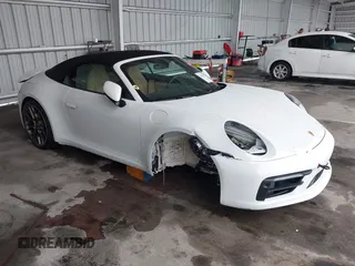2024 Porsche 911 Carrera with VIN WP0CA2A90RS238404, listed as a IAAI auction lot 42182425 with 1,994 mi miles and . Bid and sale history available at DreamBid. Image 1.