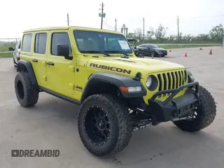 2023 Jeep Wrangler Rubicon with VIN 1C4HJXFG8PW558649, listed as a IAAI auction lot 41912816 with 38,689 mi miles and . Bid and sale history available at DreamBid. Image 1.