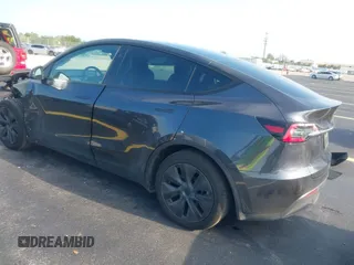 2024 Tesla Model Y with VIN 7SAYGDED3RA329355, listed as a IAAI auction lot 42343269 with 8,334 mi miles and . Bid and sale history available at DreamBid. Image 3.