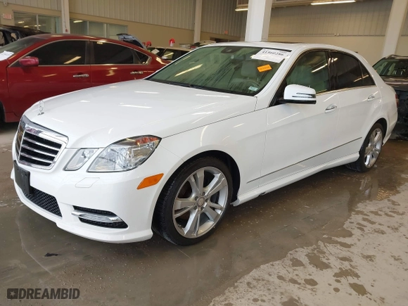 2013 Mercedes-Benz E-Class E 350 Luxury with VIN WDDHF8JBXDA745134, listed as a IAAI auction lot 41560286 with 125,208 mi miles. Bid and sale history available at carsss.com. Image 2.