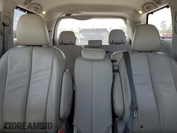 2012 Toyota Sienna XLE AAS with VIN 5TDYK3DCXCS199580, listed as a Copart auction lot 52455405 with 113,259 mi miles and Salvage Title. Bid and sale history available at DreamBid. Image 10.