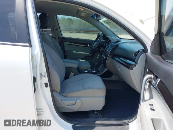 2011 Kia Sorento LX with VIN 5XYKT3A1XBG037157, listed as a IAAI auction lot 42041481 with 196,151 mi miles and . Bid and sale history available at DreamBid. Image 5.