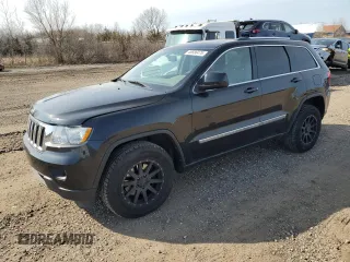 2012 Jeep Grand Cherokee Laredo with VIN 1C4RJFAG5CC280262, listed as a Copart auction lot 48686475 with 130,673 mi miles and Salvage Title. Bid and sale history available at carsss.com. Image 1.
