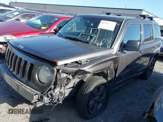 2015 Jeep Patriot High Altitude with VIN 1C4NJPFA2FD126535, listed as a IAAI auction lot 41517015 with 162,403 mi miles and . Bid and sale history available at DreamBid. Image 2.