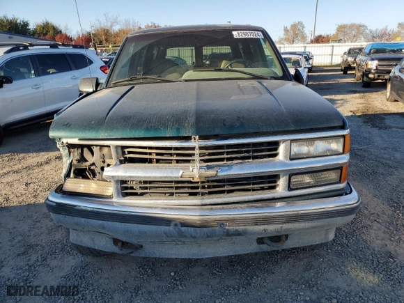 1995 Chevrolet Tahoe with VIN 1GNEK13K0SJ445250, listed as a Copart auction lot 82987024 with 125,517 mi miles and Salvage Title. Bid and sale history available at carsss.com. Image 5.