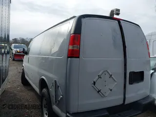 2010 GMC Savana Cargo Van with VIN 1GTZGFBA5A1161399, listed as a IAAI auction lot 41486439 with 158,956 mi miles. Bid and sale history available at carsss.com. Image 3.