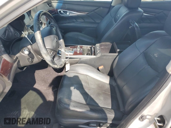 2013 Infiniti M with VIN JN1BY1AP5DM512633, listed as a Copart auction lot 63625755 with 102,190 mi miles and Salvage title. Bid and sale history available at DreamBid. Image 7.