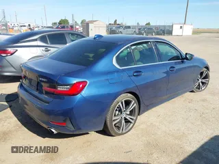 2021 BMW 3 Series 330i z VIN 3MW5R1J03M8B71429, wystawiony jako IAAI lot #42290683 z przebiegiem Nie podano mil oraz . Historia ofert i sprzedaży dostępna na DreamBid. Obrazek 4.