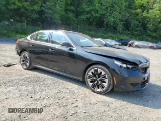 2024 BMW 5 Series 530i xDrive with VIN WBA53FJ04RCP87607, listed as a Copart auction lot 58768065 with 11,596 mi miles and Salvage title. Bid and sale history available at DreamBid. Image 4.