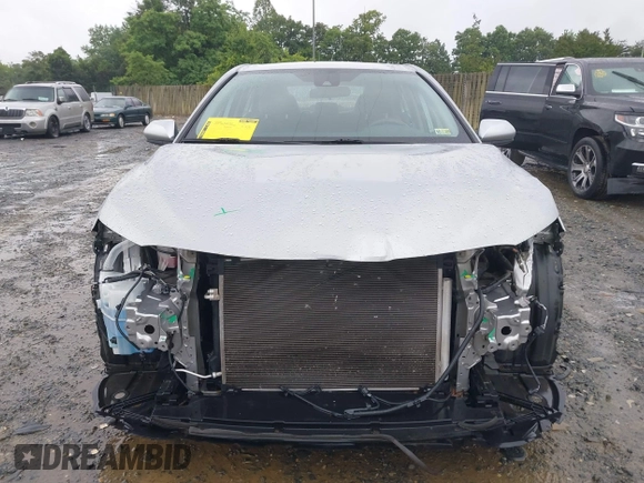 2019 Toyota Camry LE z VIN 4T1B11HK0KU698215, wystawiony jako IAAI lot #42319699 z przebiegiem 54 864 mil mil oraz . Historia ofert i sprzedaży dostępna na DreamBid. Obrazek 13.