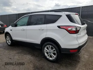 2018 Ford Escape SE with VIN 1FMCU9GD5JUA41244, listed as a Copart auction lot 54447615 with 128,542 mi miles and Clean Title. Bid and sale history available at carsss.com. Image 2.