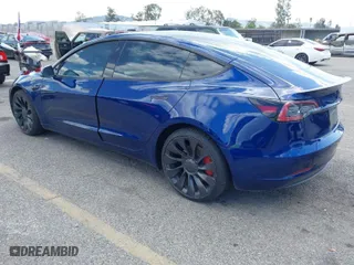 2022 Tesla Model 3 Performance with VIN 5YJ3E1EC1NF296758, listed as a IAAI auction lot 41960443 with 30,754 mi miles. Bid and sale history available at carsss.com. Image 3.