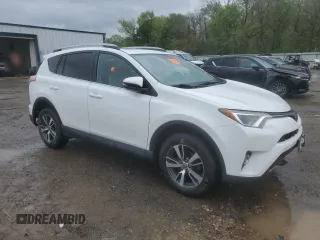 2018 Toyota RAV4 XLE with VIN 2T3WFREV9JW405921, listed as a Copart auction lot 50695175 with 133,019 mi miles and Salvage Title. Bid and sale history available at carsss.com. Image 4.