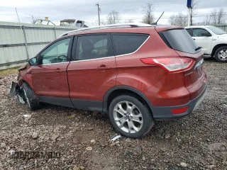 2014 Ford Escape Titanium with VIN 1FMCU9J94EUB20852, listed as a Copart auction lot 51412835 with 170,817 mi miles and Salvage Title. Bid and sale history available at DreamBid. Image 2.