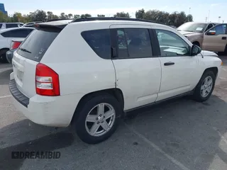 2007 Jeep Compass Sport with VIN 1J8FT47W77D145745, listed as a IAAI auction lot 41687495 with 218,231 mi miles. Bid and sale history available at carsss.com. Image 4.