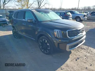 2023 Kia Telluride SX Prestige X-Line z VIN 5XYP5DGC1PG357568, wystawiony jako IAAI lot #41836148 z przebiegiem 27 194 mil mil oraz . Historia ofert i sprzedaży dostępna na DreamBid. Obrazek 1.