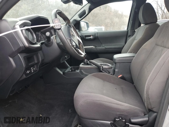 2018 Toyota Tacoma SR z VIN 3TMCZ5AN2JM122416, wystawiony jako Copart lot #61351225 z przebiegiem Nie podano mil oraz Szkoda całkowita • Salvage title. Historia ofert i sprzedaży dostępna na DreamBid. Obrazek 7.