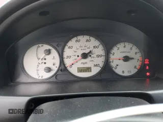 2002 Mazda Protege DX z VIN JM1BJ225320636991, wystawiony jako Copart lot #57915265 z przebiegiem 123 371 mil mil oraz Szkoda całkowita • Salvage title. Historia ofert i sprzedaży dostępna na DreamBid. Obrazek 9.