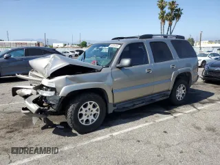 2002 Chevrolet Tahoe Z71 z VIN 1GNEK13T52R189665, wystawiony jako Copart lot #58009355 z przebiegiem 136 558 mil mil oraz Szkoda całkowita • Salvage title. Historia ofert i sprzedaży dostępna na DreamBid. Obrazek 1.