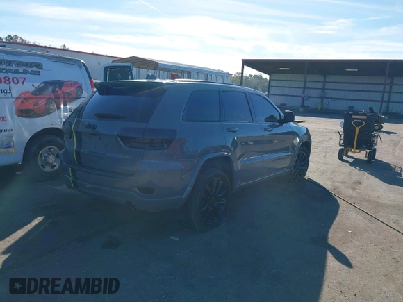 2021 Jeep Grand Cherokee Laredo E with VIN 1C4RJEAG3MC713511, listed as a IAAI auction lot 41235904 with 73,343 mi miles and . Bid and sale history available at DreamBid. Image 4.