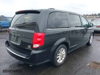 2019 Dodge Grand Caravan SXT with VIN 2C4RDGCG0KR595339, listed as a IAAI auction lot 41841547 with 96,888 mi miles. Bid and sale history available at carsss.com. Image 4.