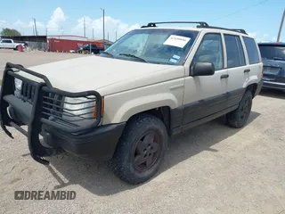 1995 Jeep Grand Cherokee Laredo with VIN 1J4GZ58Y5SC541987, listed as a IAAI auction lot 42430890 with 246,824 mi miles and . Bid and sale history available at DreamBid. Image 2.