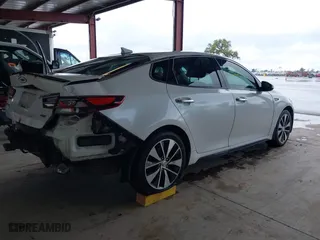 2017 Kia Optima SX with VIN 5XXGW4L2XHG136843, listed as a IAAI auction lot 41806606 with 157,899 mi miles. Bid and sale history available at carsss.com. Image 4.