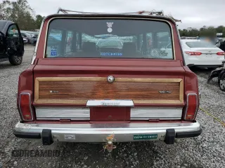 1986 Jeep Grand Wagoneer z VIN 1JCNJ15U6GT029563, wystawiony jako Copart lot #78917364 z przebiegiem 115 025 mil mil oraz Szkoda całkowita • Salvage title. Historia ofert i sprzedaży dostępna na DreamBid. Obrazek 6.