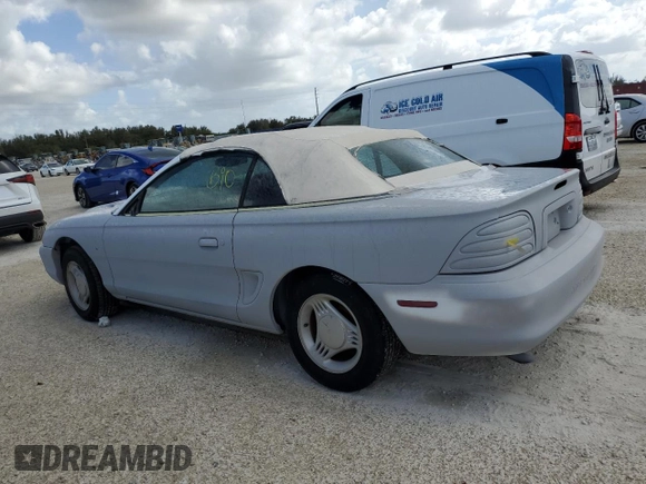 1995 Ford Mustang with VIN 1FALP4444SF177184, listed as a Copart auction lot 78695874 with 119,729 mi miles and Salvage title. Bid and sale history available at DreamBid. Image 2.