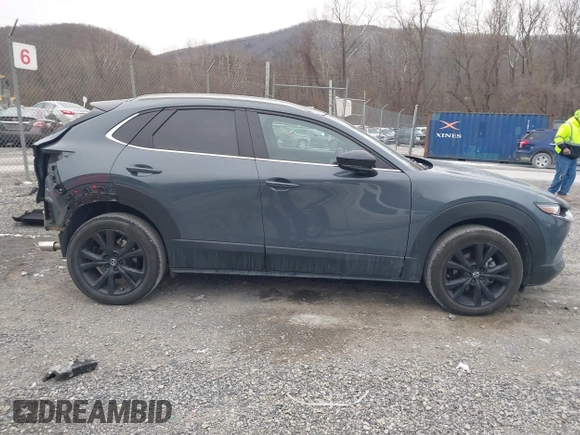 2023 Mazda CX-30 2.5 S Carbon Edition with VIN 3MVDMBCM8PM584296, listed as a IAAI auction lot 41390814 with 19,959 mi miles. Bid and sale history available at carsss.com. Image 13.