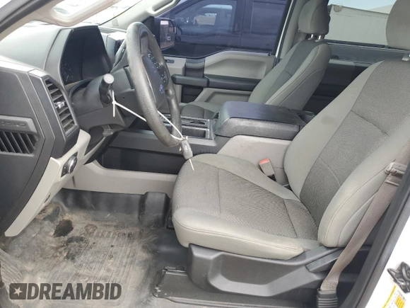 2018 Ford F-150 XL with VIN 1FTEW1E50JFC65370, listed as a Copart auction lot 59222655 with 213,487 mi miles and Salvage title. Bid and sale history available at DreamBid. Image 7.