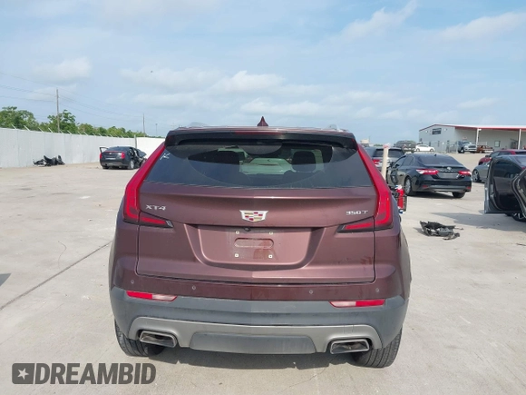 2023 Cadillac XT4 FWD Premium Luxury with VIN 1GYFZCR47PF106017, listed as a IAAI auction lot 42283401 with 40,734 mi miles and . Bid and sale history available at DreamBid. Image 16.