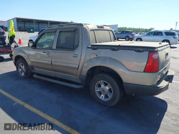 2004 Ford Explorer Sport Trac XLS z VIN 1FMZU67K24UA66100, wystawiony jako IAAI lot #42035953 z przebiegiem 217 105 mil mil oraz . Historia ofert i sprzedaży dostępna na DreamBid. Obrazek 3.