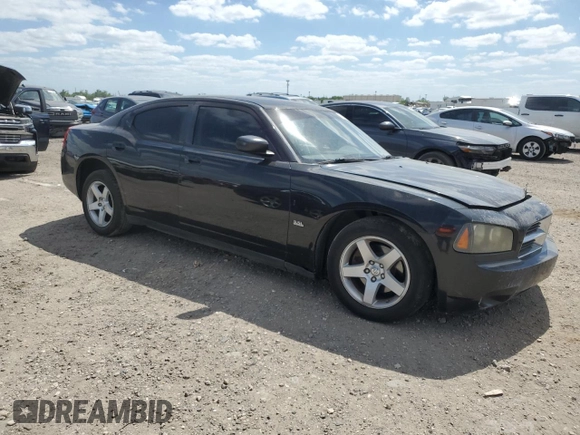 2009 Dodge Charger SXT with VIN 2B3KA33V09H503519, listed as a Copart auction lot 52825785 with 112,483 mi miles and Salvage Title. Bid and sale history available at carsss.com. Image 4.