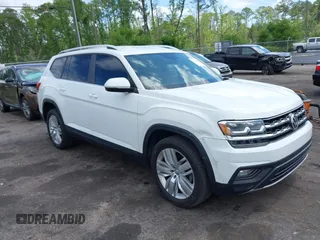 2019 Volkswagen Atlas SE z VIN 1V2WR2CA4KC509962, wystawiony jako IAAI lot #42147840 z przebiegiem 67 557 mil mil oraz . Historia ofert i sprzedaży dostępna na DreamBid. Obrazek 1.