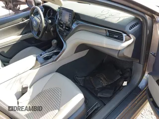 2023 Toyota Camry SE z VIN 4T1G11BK6PU096991, wystawiony jako IAAI lot #42062219 z przebiegiem 82 824 mil mil oraz . Historia ofert i sprzedaży dostępna na DreamBid. Obrazek 5.