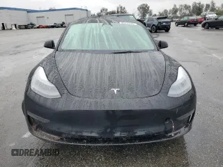2023 Tesla Model 3 with VIN 5YJ3E1EA2PF671865, listed as a Copart auction lot 45220285 with 29,614 mi miles and Salvage title. Bid and sale history available at DreamBid. Image 5.
