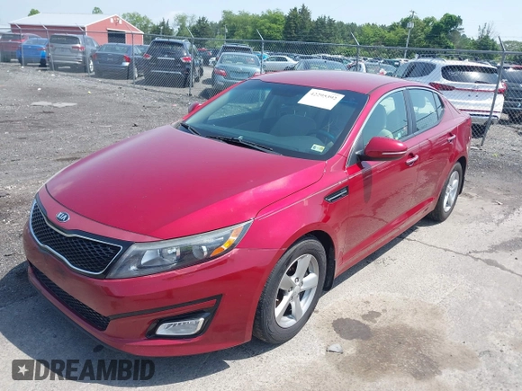2015 Kia Optima LX z VIN 5XXGM4A72FG407864, wystawiony jako IAAI lot #42295392 z przebiegiem 177 485 mil mil oraz . Historia ofert i sprzedaży dostępna na DreamBid. Obrazek 2.