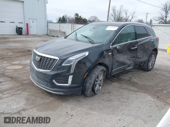 2021 Cadillac XT5 AWD Premium Luxury with VIN 1GYKNDRS7MZ168493, listed as a IAAI auction lot 41395162 with 33,064 mi miles. Bid and sale history available at carsss.com. Image 17.