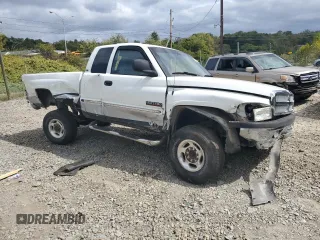 2001 Dodge Ram 2500 with VIN 1B7KF23771J220856, listed as a Copart auction lot 71387594 with 316,547 mi miles and Salvage Title. Bid and sale history available at carsss.com. Image 4.