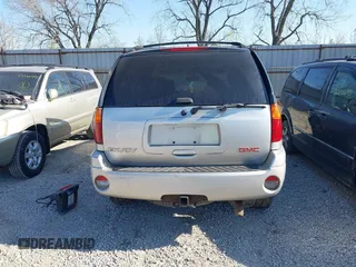 2005 GMC Envoy SLE with VIN 1GKDT13S952256293, listed as a IAAI auction lot 42048366 with 225,753 mi miles and . Bid and sale history available at DreamBid. Image 15.