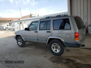 2000 Jeep Cherokee with VIN 1J4FF48S7YL221475, listed as a Copart auction lot 53005275 with 273,246 mi miles and Clean title. Bid and sale history available at DreamBid. Image 2.